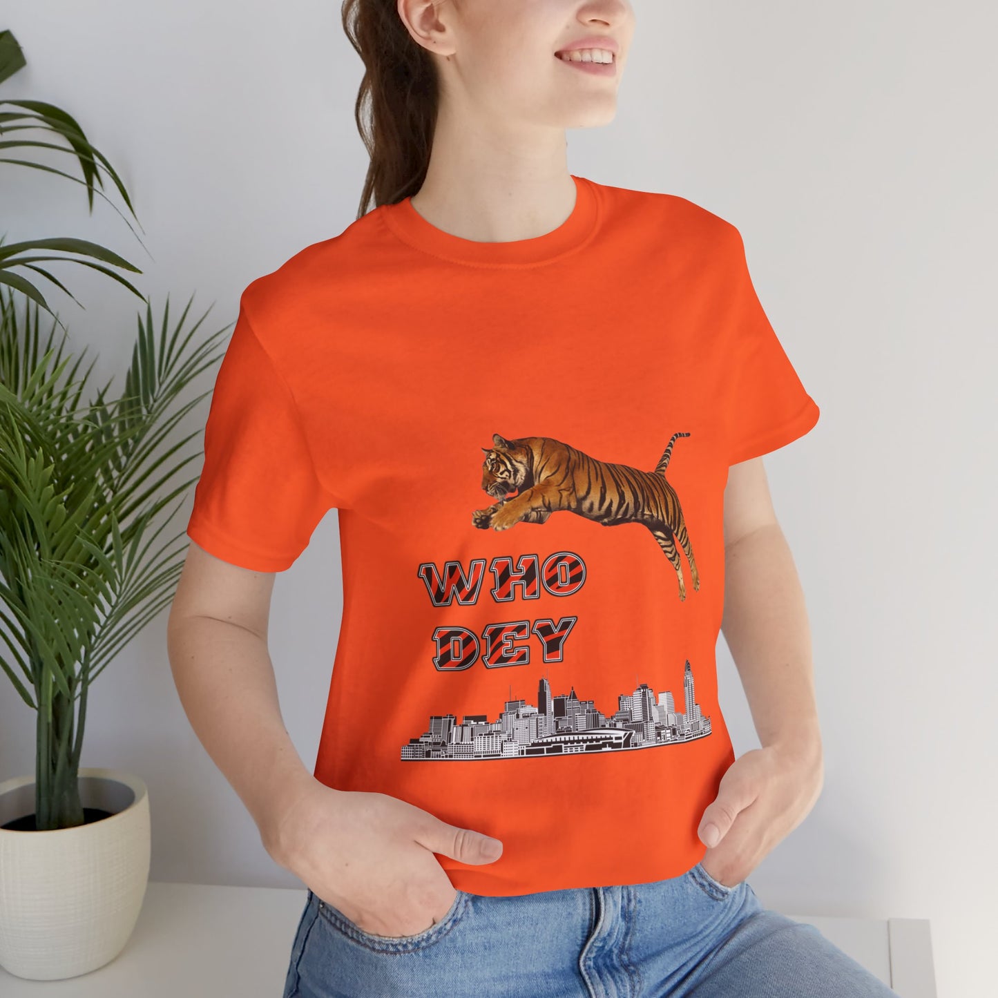 Leaping tiger over city Unisex Jersey Short Sleeve Tee